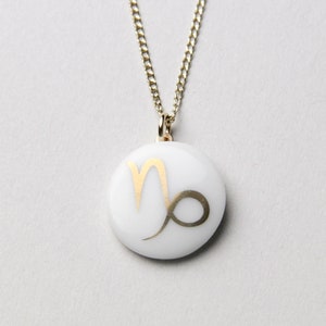 Capricorn porcelain pendant, gold, sign of the zodiac. image 1