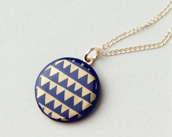 Blue porcelain pendant, gold circus.