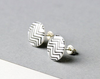 Stud earrings, snow-white porcelain, black zigzag
