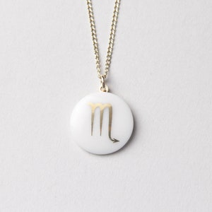 Scorpio porcelain pendant, gold, sign of the zodiac. image 1