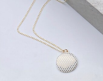 White porcelain pendant, with gold dots