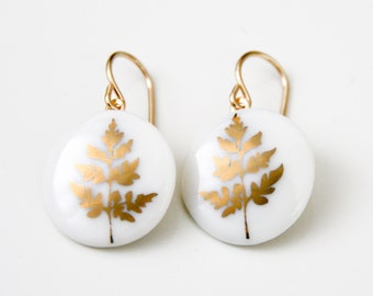 Snow-white porcelain Pendant earrings, golden leaf