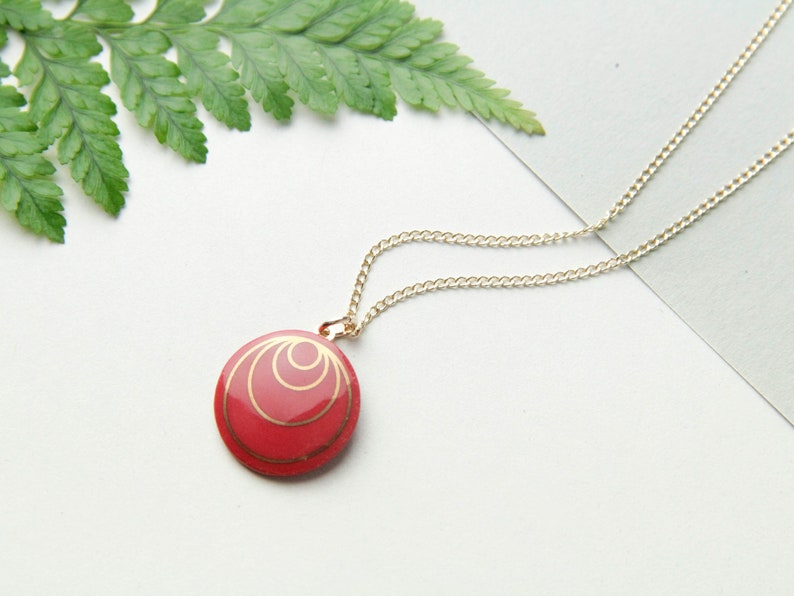 Red porcelain pendant, with gold circles. image 4