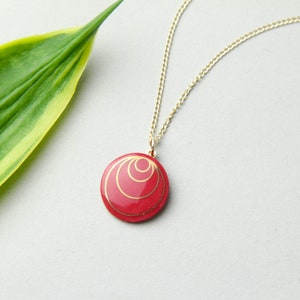 Red porcelain pendant, with gold circles. image 3