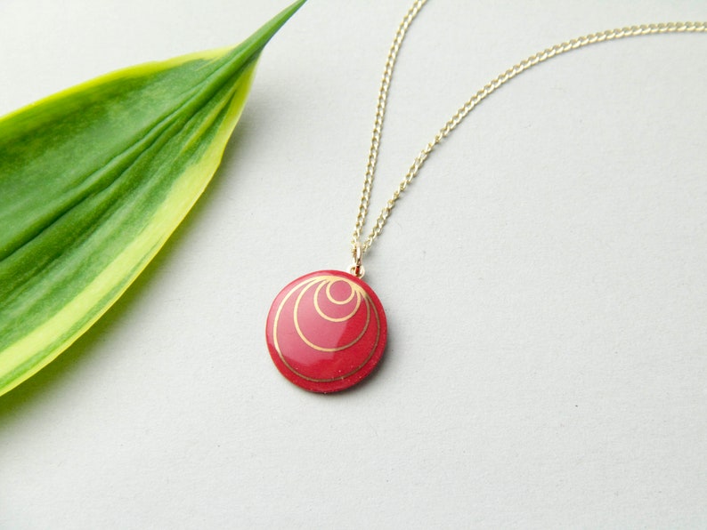 Red porcelain pendant, with gold circles. image 3