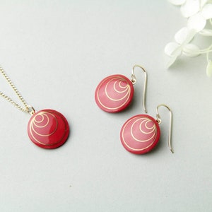 Red porcelain pendant, with gold circles. image 2