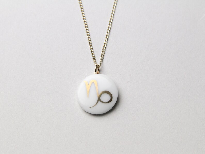 Capricorn porcelain pendant, gold, sign of the zodiac. image 1