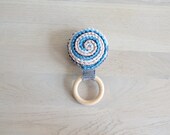grey pastel spiral teether for babies, crochet teething toy in blue, grey and pink, attached to organic wooden ring, great baby shower gift