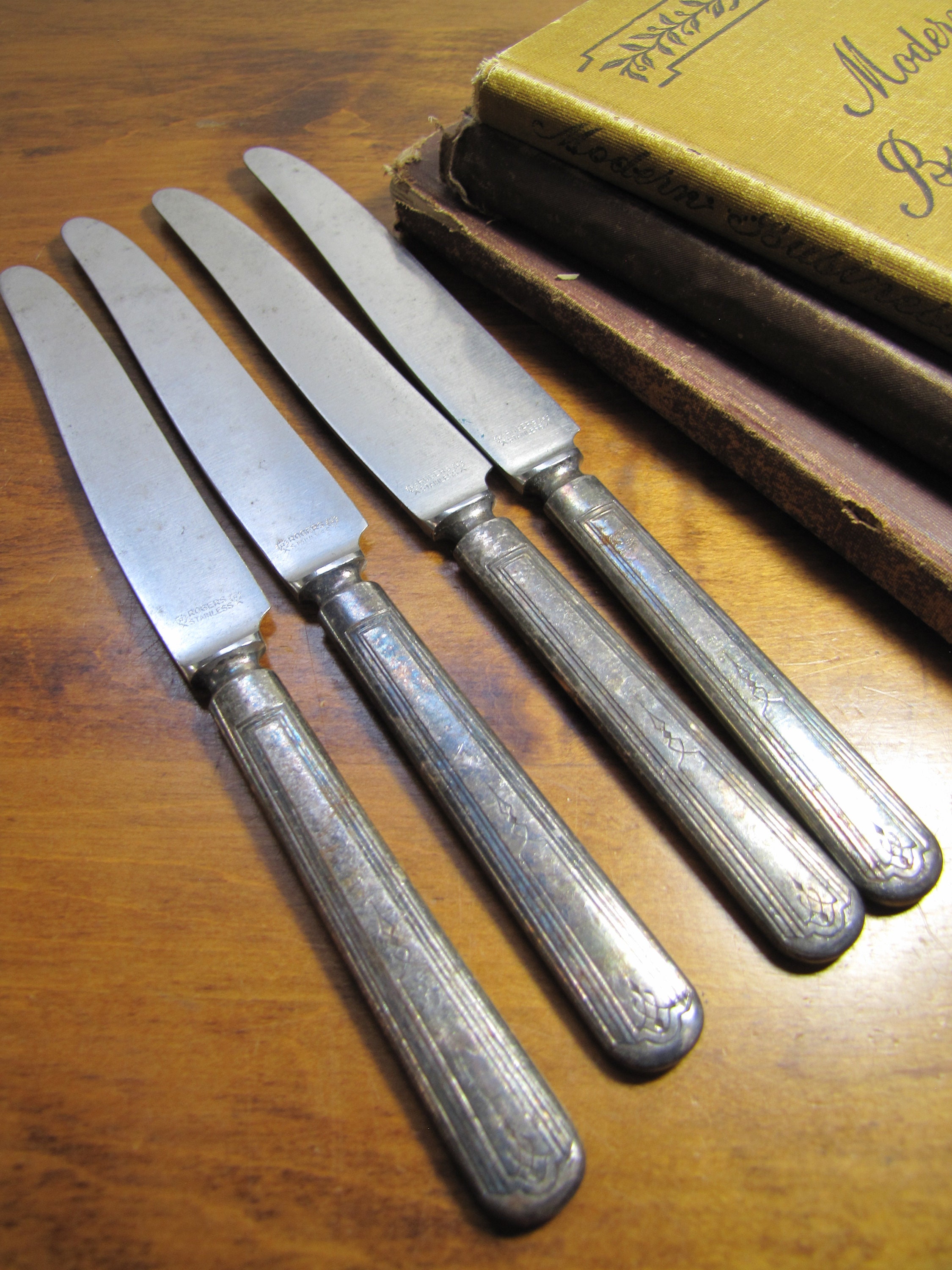 Four (4) Vintage 1881 Rogers Dinner Knives - Silver Plated Handles
