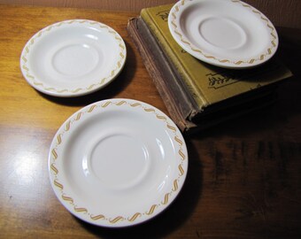 Vintage Buffalo China Saucers (3)