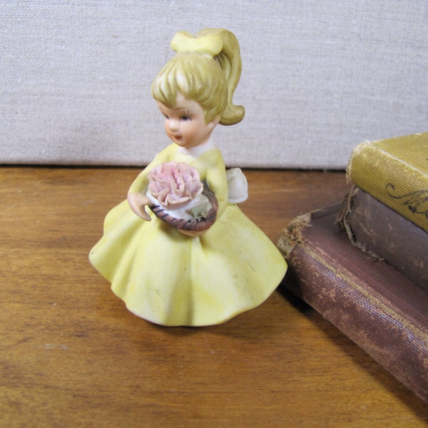 Small Porcelain Figurine - Girl With Ponytail in a Yellow Dress With Flowers - Matte Finish