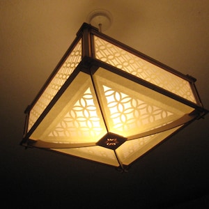 Japanese style lampshade. light-wood frame, circle pattern