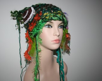 Deep in the forest next to the river... Freeform Knit Hat. Made With My Hand spun art yarn. OOAK Wearable Art. Soft Merino wool. Unique.