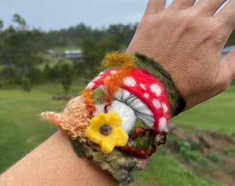 Felted Toadstool and flowers Bracelet Wrist Cuff. OOAK fairy tale Wearable Art. Pixie Fairy Accessory. Fairycore. Toadstool. Ties up.