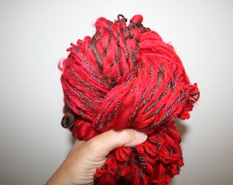 Hand spun art yarn 114. Hand spun artsy novelty art yarn. Red and brown Fibre art craft bundle. Chunky spiral yarn. Hand Made in Australia.