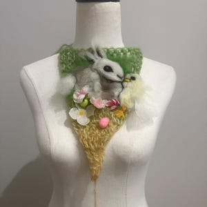 Easter bunny and chick Art to wear neck piece. Needle Felted embellished crocheted necklace, flowers. Hand dyed wool locks. Art yarn.