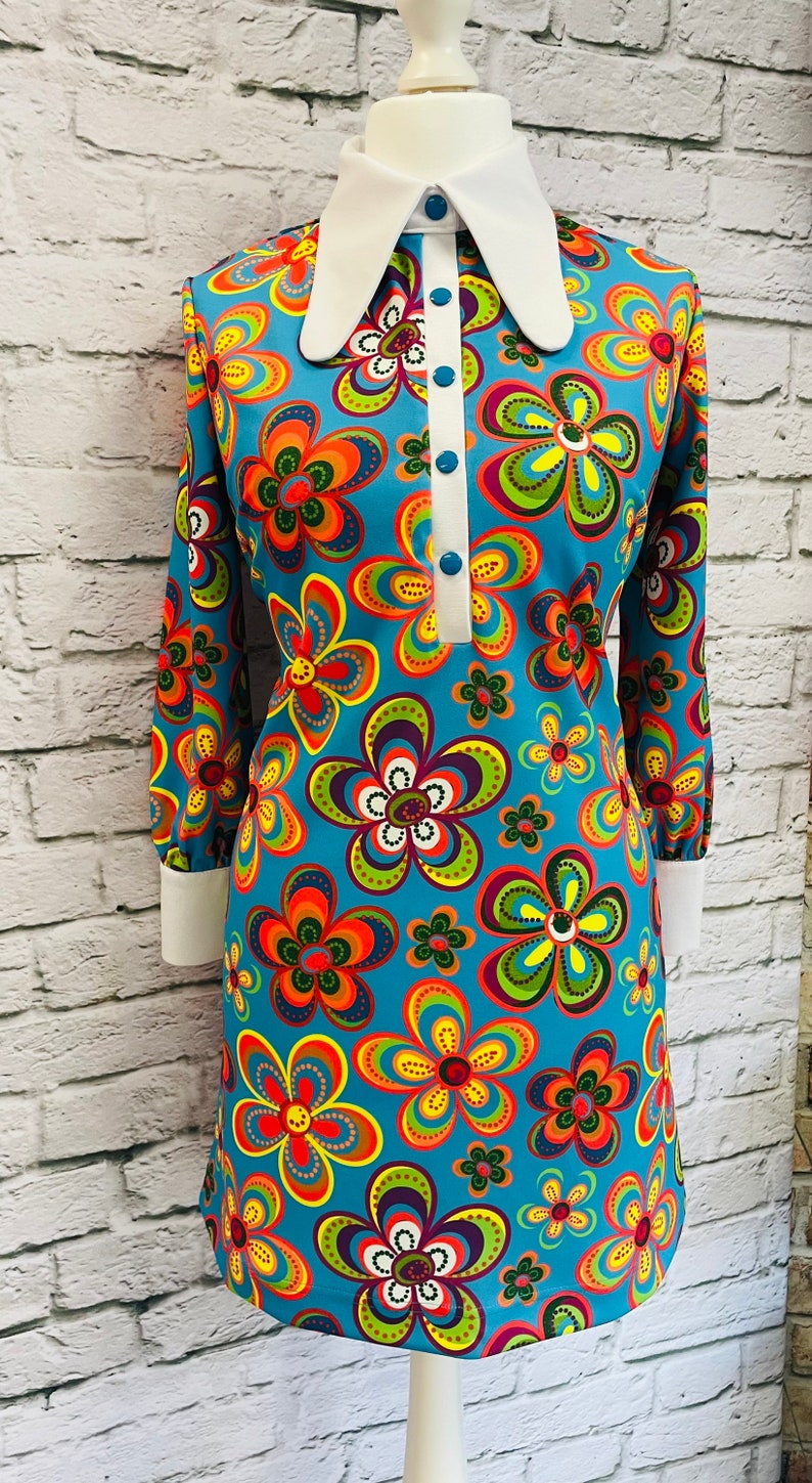Shop Queen’s Gambit Outfits – 60s Clothes     Floral 60s Mod dress retro inspired  AT vintagedancer.com