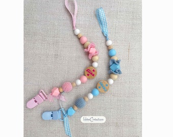 Pacifier clip personalized with the child's first name, pink or blue model