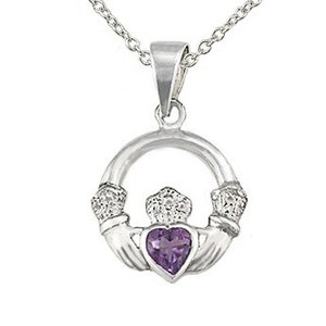 May include: A silver Celtic knot pendant necklace with a purple amethyst heart in the center. The pendant features two hands clasped together, symbolizing love and friendship.