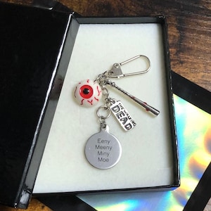 The Walking Dead inspiriert Schlüssel Anhänger Geschenk Box Lucille Bat Eeny Meeny Miny Moe Augen Anhänger Andenken Weihnachten Geburtstag Angst vor den Toten Negan inspiriert