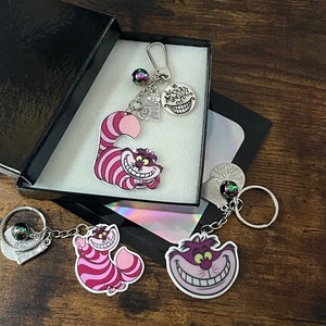 Film d'Alice au pays des merveilles Le chat du Cheshire inspiré de Disney Nous sommes tous fous ici souvenir coffret cadeau porte-clés charms de sac 3 types au choix