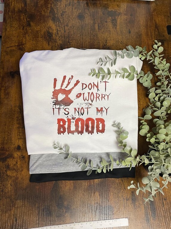 Halloween Mens Blood Vinyl Printed T Shirt Don’t Worry It’s Not My Blood Fun Novelty Keepsake Hand Print Splats Scary Spooky Gift Top