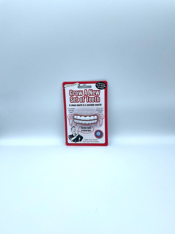 Grow a new set of TEETH fun quirky secret Santa stocking filler christmas gift grows up to 600% perfect teeth in three days smile laugh