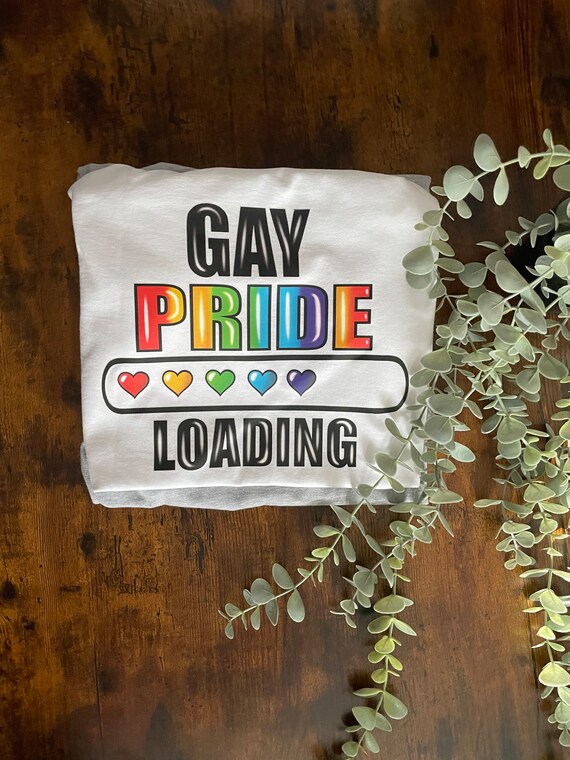 Gay Pride Loading Vinyl Printed T-Shirt Rainbow Heart Colours LGBTQ Month Fun Quirky Novelty Gift Lovers Celebrate Wear With Pride
