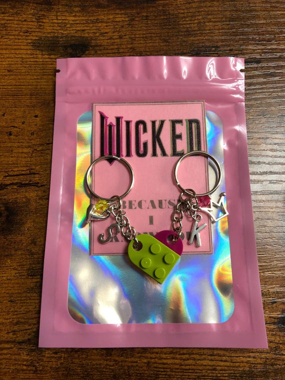 Personalised Initial Letter WICKED Musical Film Inspired Two Key Ring Charm Lego Pieces Crown Witches Hat Colour Beads Green Pink Card Bag