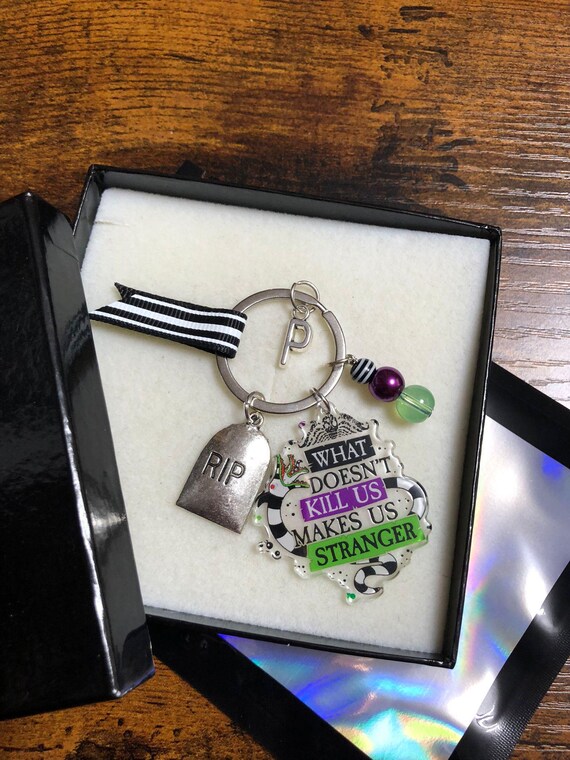 Personalised Letter BEETLE JUICE Film Inspired Key Charm RIP What Doesn’t Kill Us Makes Us Stranger Stripe Beads Ribbon Gift Box Shimmer Bag