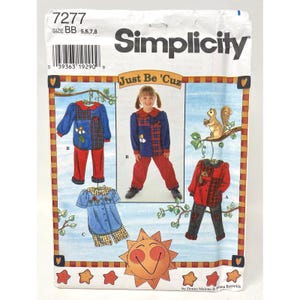 May include: Simplicity sewing pattern featuring children's clothing designs. The pattern includes options for a collared shirt, pants, and shorts. The package has a colorful illustration of the finished garments and a smiling sun.