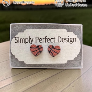 Basketball heart studs on a card in a gift box outdoors