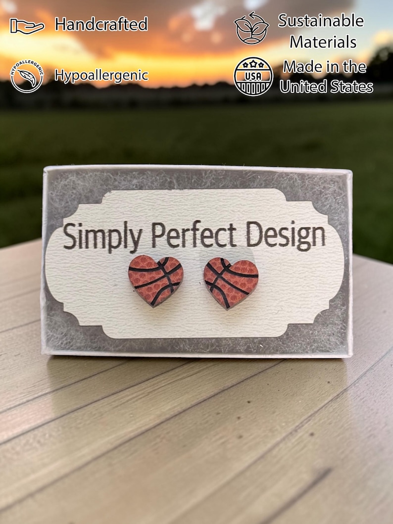 Basketball heart studs on a card in a gift box outdoors