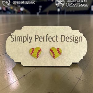 Softball heart stud earrings on a Simply Perfect Design card