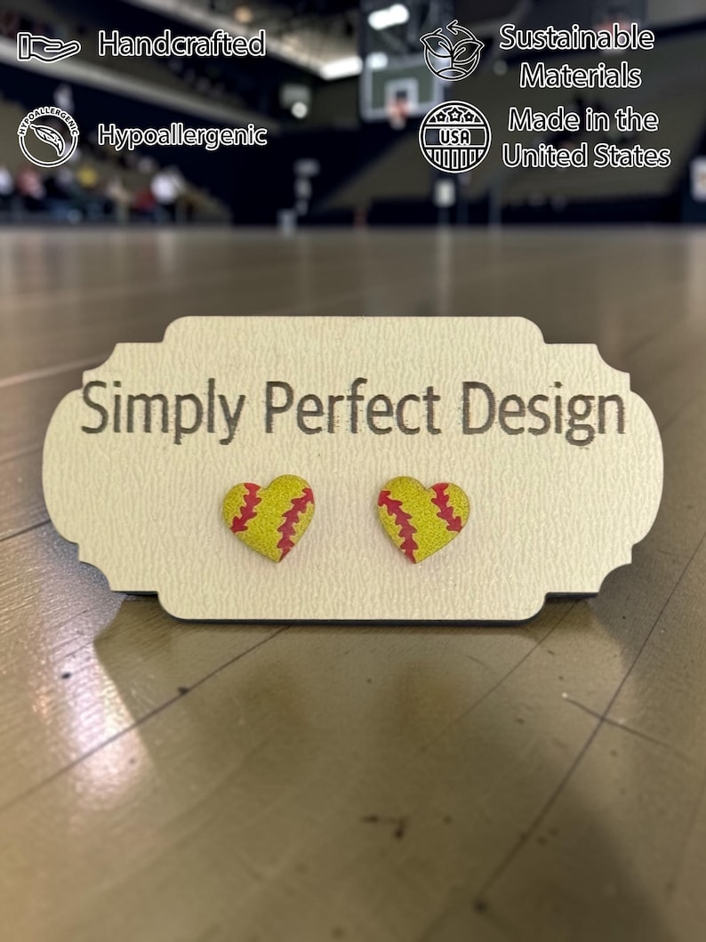 Softball heart stud earrings on a Simply Perfect Design card