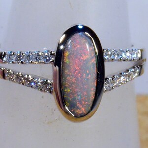Solid Australian Black Opal in Solid 18k White Gold Ring With 20 Diamonds Highlighting 13871