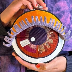 Fiber Art Eye Sculpture: Embroidered Wall Hanging in Bamboo Hoop