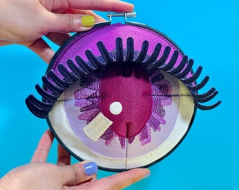 RAJA |  fiber art sculpture of violet and purple eye, one-of-a-kind design handmade by artist, quirky wall decor, eye see you