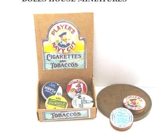various vintage tin SHOP DISPLAYS