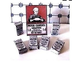 May include: A collection of miniature boxes with the text "Peter Coopers Gelatine 1d Why not more?" printed on the front. The boxes are white with black lettering and are arranged on a white tiled surface.