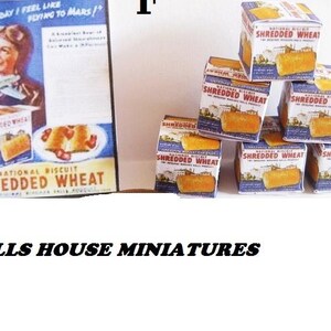 May include: A set of miniature boxes of National Biscuit Shredded Wheat cereal. The boxes are stacked in a pyramid shape and feature a vintage design with a red, white, and blue color scheme. The boxes are labeled "National Biscuit Shredded Wheat" and feature an image of a bowl of cereal.