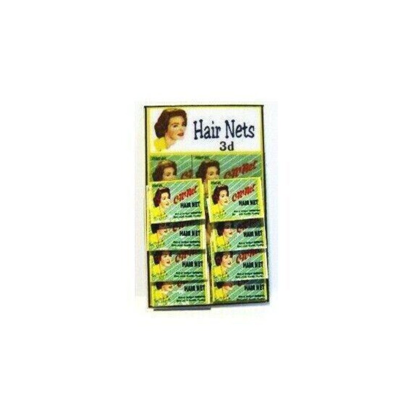 Puede incluir: Una pantalla de 12 paquetes de redes para el cabello, cada uno con la cara de una mujer y el texto "cmnet HAIR NET". La pantalla est&aacute; etiquetada como "Hair Nets 3d".