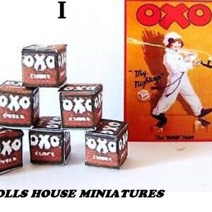 May include: A set of six miniature boxes, each with the word "OXO" printed on the front. The boxes are stacked in a pyramid shape. The boxes are brown and white and have a vintage look. The boxes are a miniature replica of the classic OXO brand.