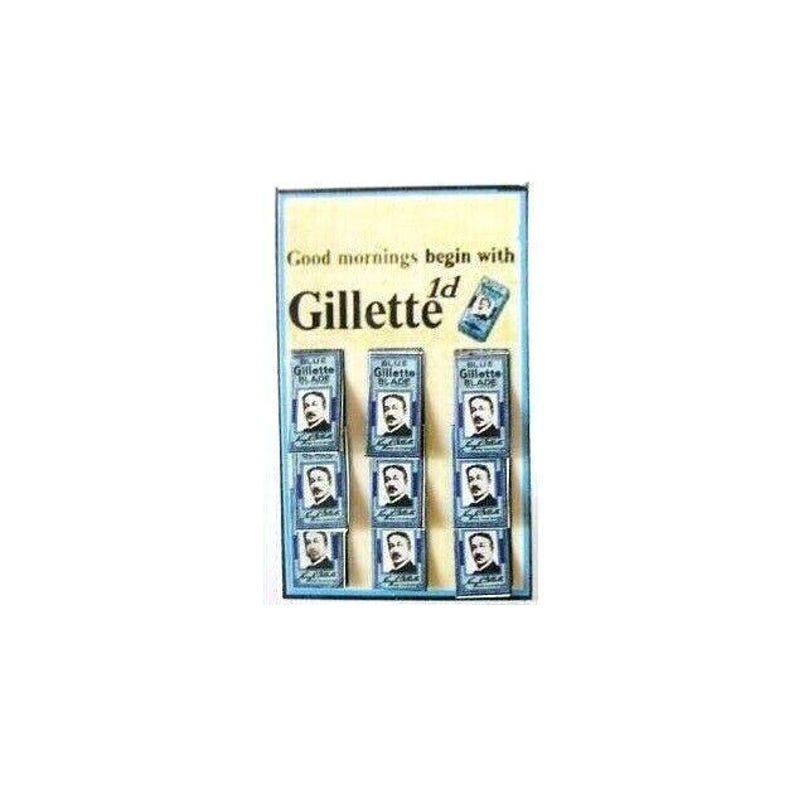 Puede incluir: Un anuncio vintage de Gillette Blue Blades. El anuncio presenta una pantalla de ocho cajas de cuchillas de afeitar con la cara de un hombre en cada caja. El texto del anuncio dice "Good mornings begin with 1d Gillette".