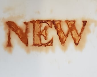 40 x 40cm rust dyed cloth sayings capital letters n e w  word NEW text eco dyeing textile fabric sew patchwork stitch collage quilt sewing