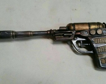 Magnum Flux pistol.