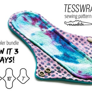 May include: A TESSWRAP sewing pattern sampler bundle by versodile featuring a cloth pad with a tie-dye blue, purple, and white top and a pink and black polka dot underside with two metal snaps. Includes diagrams for 11 inch, 10 inch, and 7 inch sizes.