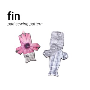 May include: Two reusable cloth menstrual pads, one with a floral print and the other with a wood grain print. The pads are folded in half and have snaps on the sides. The text "fin pad sewing pattern" is printed on a white background.