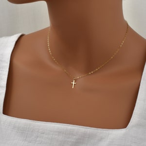 Simple Gold Cross Necklace for Women. Small Cross Charm on a Dainty Golden Chain. High Quality 14K Gold Filled Christian Necklaces.