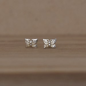 Cute Butterfly Stud Earrings in Sterling Silver. Small, Simple, Minimalist Silver Studs. Feminine Stud Earrings for Girls and Women.